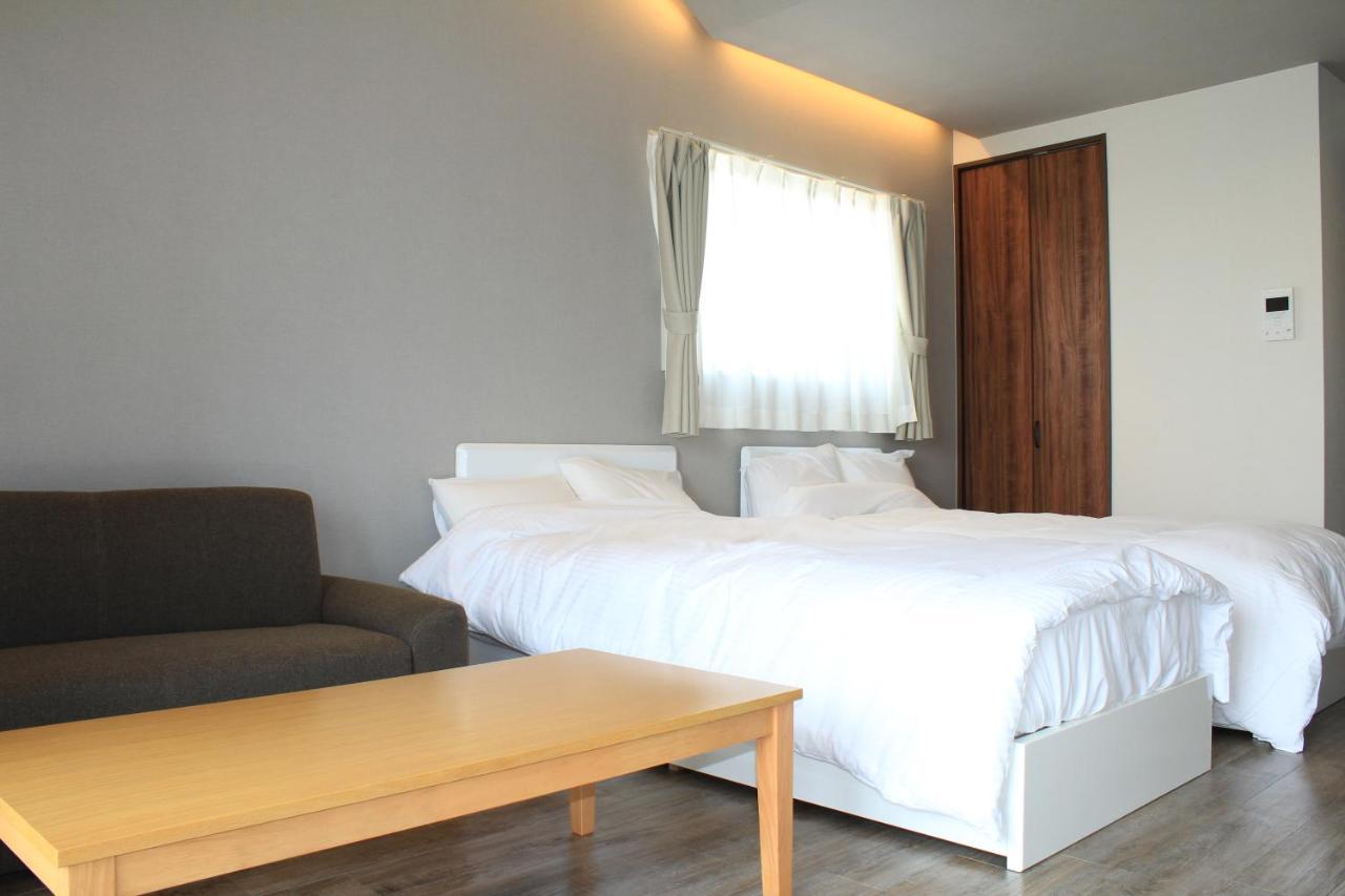 Gate Inn Nago Bagian luar foto